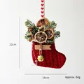 Red knit Christmas stocking with pine needles, dried orange, and wood Merry Christmas tag - Gold Bell Decorative Stocking
