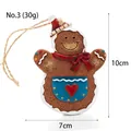 Brown resin gingerbread man Christmas ornament with red bow and blue heart pocket - Heart Pocket Style (3)