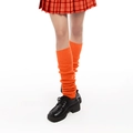 Vibrant orange knitted loose leg warmers for women worn with a plaid skirt and black shoes - Orange