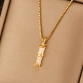Minimalist gold titanium necklace featuring a white bamboo pendant with leaf accents - Gold Bamboo Faux Jade Pendant Box Chain