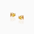 Macro detail of creative fish stud earrings with yellow faceted gemstones and gold plating - Tropical Fish