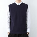 Men's navy knit vest with round neck paired with white shirt for a clean layered look - Navy Blue