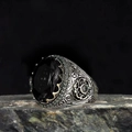 Vintage punk ring with a large black oval gemstone in an ornate carved silver setting - US 7 / Black Oval Gemstone