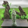 10cm Virgin Mary statue carved from green gemstone with black spots on wood base - Kiwi