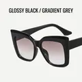Glossy black cat eye sunglasses with grey gradient lenses and wide frame for women - Metal Hinge / Bright Black / Gradient Gray