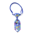 Easter pet tie featuring a blue ribbon with rabbits, eggs, and an adjustable strap - Royal Blue Easter