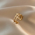 Double-layered gold ring with polished cross and sparkling zircon pavé in an open design - Gold