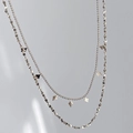 Detail of layered stainless steel necklace with bead chain and diamond-shaped charms - Steel Color Gypsophila + Bead Chain + Rhombus Sequin