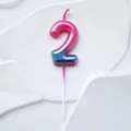 Pink and blue gradient birthday candle in number 2 shape with gold glitter finish - Pink Lake Blue Gradient Number 2 Candle