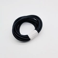Close-up of 6mm black PU leather cord with fine stitching for DIY bag strap accessories - Black