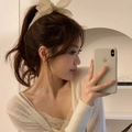 Elegant cream white large bow hair claw clip styled with a lace top and knit cardigan - Chiffon Bow Banana Clip / White