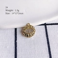 Detailed view of evil eye alloy pendant with white rhinestones measuring 14x13x2mm - 2# (Eye Style B)
