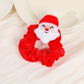 Detailed view of a plush red Christmas scrunchie with a soft embroidered Santa Claus - Christmas Cartoon Scrunchie - Santa B