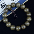 Macro shot of 15 Phoebe zhennan wood beads showing detailed golden silk grain texture - Fine Small Hole Craft / 15mm*15 Beads