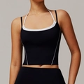 Two-tone halter sports bra in black and white with slim straps and high-stretch fabric - S / Premium Black