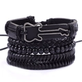 Close-up of stacked black leather bracelets with braided rope and guitar charm detail - Guitar