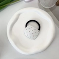 Detail of square white hair tie with colorful polka dots on a minimalist tray - Square Rhinestone Hair Tie / White