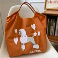 Bolso tote de nailon naranja con bordado de caniche, asas tejidas y cordón - Caniche Naranja