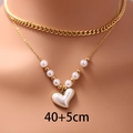 Collana a due strati in acciaio inossidabile dorato con perle bianche e grande cuore - Stile Doppio Strato Perla Cuore