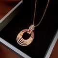 Detail of luxury gold necklace with layered rings, red gems and crystal inlay - 86# Necklace (86#) / Gold-Red