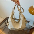 Beige wrinkled nylon crescent crossbody bag with multiple zippers and wide strap - Beige