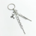 Detailed view of silver medical keychain with stethoscope, syringe, and thermometer charms - Style 6 (Polished Silver 4-Piece Set)