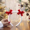 Christmas reindeer headband featuring golden antlers, white fur and red velvet bow detail - Pearl Bowknot