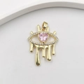 Gold plated evil eye pendant with pink heart zircon on white textured surface - Teary Eye Heart Zircon Gold HY0011