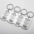 Detailed view of polished stainless steel dog tag keychains with laser-engraved quotes - Keychain / Silver