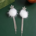 Detail of snowflake earrings with white fur balls and silver tassels on a green desk - Snowflake Pom-Pom Tassel Style / Silver (Silver Pin)