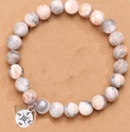 Close-up of 8mm pink zebra jasper stone bead bracelet with a compass metal charm - Compass Rose Red No Card