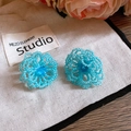 Detailed view of handmade sky blue beaded flower earrings on a minimalist canvas bag - 23# Silver Needle-Blue-Flower