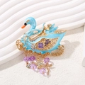 Blue enamel swan brooch with gold metal edge and dangling crystal star charms - Blue Swan Moon Star Design (DW0256)