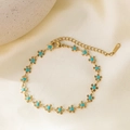 Gold chain bracelet featuring blue floral links and adjustable lobster clasp closure - Small Blue Flower Bracelet - Gold