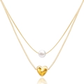 Detail of double-layer gold necklace featuring a white pearl and a 3D heart pendant - 14k / Gold
