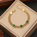 Gold mesh chain bracelet with three square green gemstones on a beige jewelry box - Green Gemstone Style (3#)