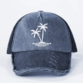Navy washed denim trucker hat with coconut tree embroidery and distressed brim details - Navy Blue