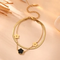 Double-layered stainless steel clover bracelet with black and gold floral pendants - Gold Black Shell Bracelet (L305)