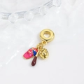 Detail of enamel baseball charm with pink cap, brown bat, and golden glove pendants - Pink and Blue Hat Baseball Set (ZYN-DMK941G-1)