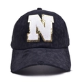 Detail of sequined N letter patch and distressed cotton texture on black baseball cap - Letter N Style (N-漏洞马尾棒球帽)