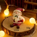 Miniature resin Santa Claus figurine holding candy cane for Christmas desktop decor - No.6 Sitting Santa Claus