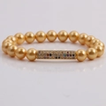8mm shell pearl bracelet with gold-plated tube and multi-color zircon stones - Yellow