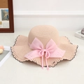 Light pink wide brim straw hat featuring mesh bow and elegant pearl embellishments - Ten Pearl Pink
