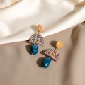 Detail of colorful acrylic geometric earrings with retro yellow and blue contrast style - Stud Earrings