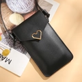 Crossbody phone bag in black faux leather with a golden heart-shaped metal buckle - Black
