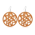 Macro shot of circular hollow wooden earrings with floral scroll pattern and metal hooks - Style 37/Round Hollow Scroll Pattern