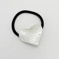 Elastic black hair tie featuring a textured silver heart charm on a white background - Matte Silver - Heart