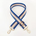 Detail of adjustable blue and gold striped nylon bag strap with polished metal lobster clasps - Sapphire Blue
