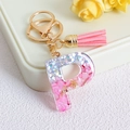 Pink glitter resin letter P keychain with tassel and silver star sequins in golden ring - Letter P / Pink