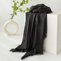 Deep grey cotton linen scarf with tassel fringe displayed on minimalist pedestal - Dark Gray